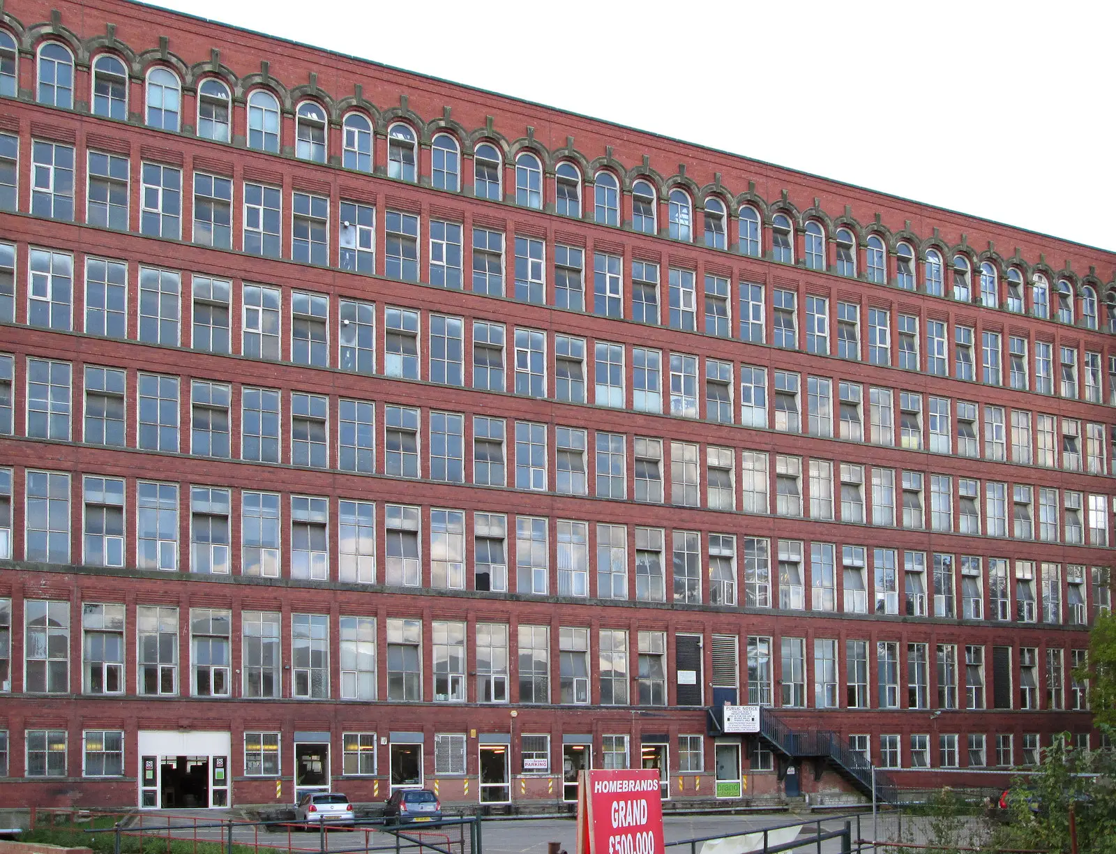 Six storeys of the East Mill’s red-brick elevation, rank upon rank of windows hanging open or missing glass.